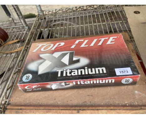 A NEW AND SEALED BOX OF 18 TOP FLITE XL TITANIUM GOLF BALLS