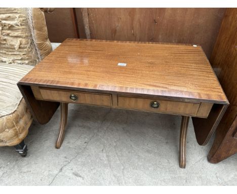 A MAHOGANY AND CROSSBANDED TWO DRAWER SOFA STYLE COFFEE TABLE