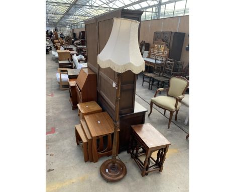 A TURNED COLUMN STANDARD LAMP WITH SHADE