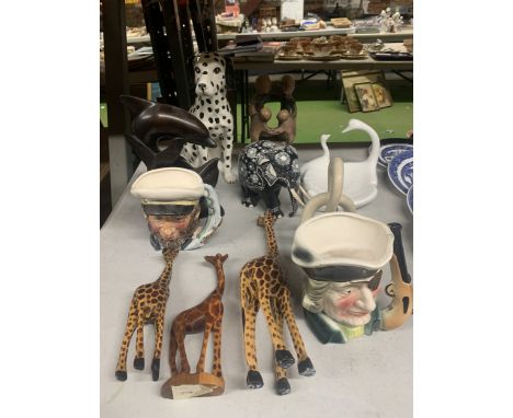 A QUANTITY OF ITEMS TO INCLUDE A CERAMIC DALMATIAN DOG, WOODEN GIRAFFES, DOLPHIN AND ELEPHANT, TOBY JUGS, ETC