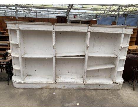 A PAINTED THREE SECTION OPEN STORAGE SHELF UNIT WITH ROUNDED CORNERS, 135" WIDE IN TOTAL
