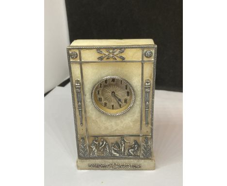 A MARBLE MANTLE CLOCK WITH SILVER FRETWORK