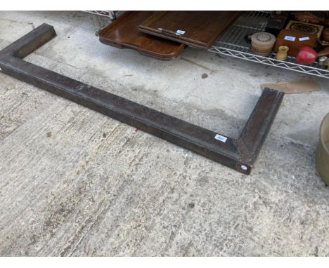A DECORATIVE VINTAGE COPPER COATED FIRE FENDER