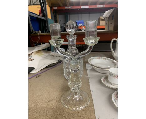 A GLASS DECANTER AND CANDLEABRA