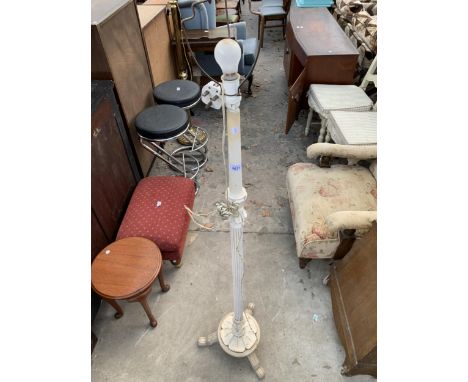 A WHITE STANDARD LAMP WITH FLUTED COLUMN