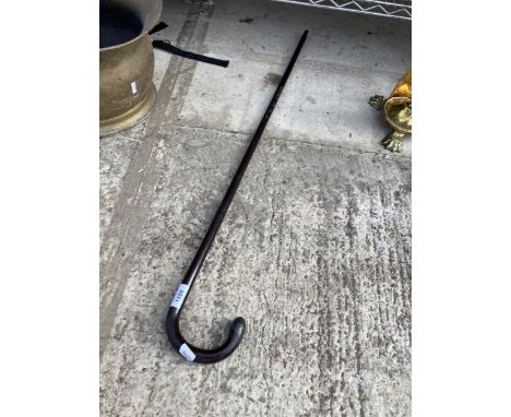 A VINTAGE WALKING STICK WITH HALLMARKED SILVER HANDLE