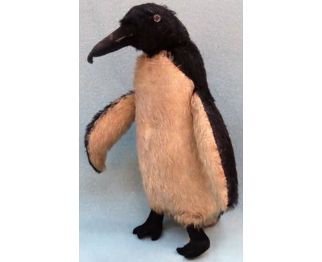 Early plush Penguin, possibly in the manner of Deans or Chad Valley. App. 25cm H

 