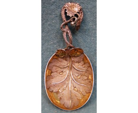 Pretty and ornate hallmarked silver and silver gilt leaf form caddy spoon, Birmingham assay. Approx. 15.7g reasonable used co
