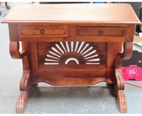 Mahogany two drawer side table, with carved Aboriginal style decoration. App. 75cm H x 95cm W x 44.5cm W Reasonable used cond