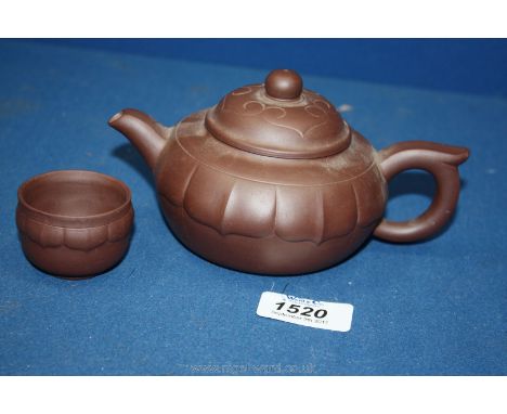 A small Chinese red clay Teapot with circular mark to base, with one tea Bowl