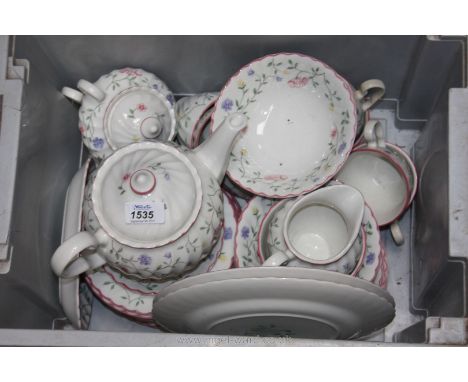 A quantity of Johnson Brothers china including plates, cups, saucers, teapot, etc.