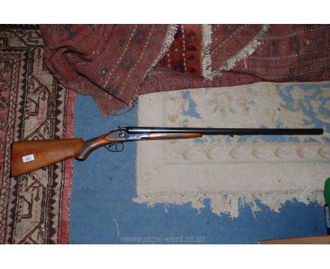 A 12 bore double barrel, side by side Russian hammer Shotgun by Baikal, serial no. P28323, 28 5/16'' barrels, (with original 
