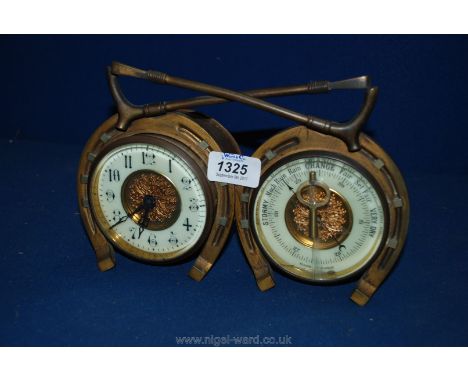 A French made Clock and Barometer, surrounded by a pair of brass horseshoes and topped with a pair of crossed riding crops, t