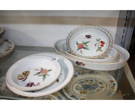 A quantity of Royal Worcester 'Evesham' including two pie dishes (slightly worn), two flan dishes and three oval dishes