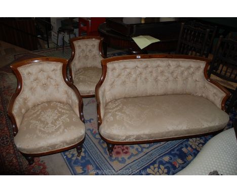 An Edwardian light Mahogany show frame three piece Salon Suite, having inlaid detail to the frame and beige shadow pattern fl