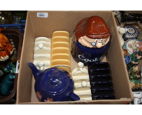A Wade Lyons Tetley Cookie Jar and Teapot together with two Lurpak toast racks, etc