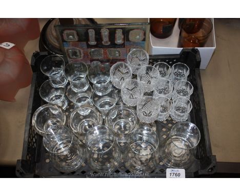 A quantity of glass including four small vases, three tea light holders, assorted crystal sherry glasses, shot glasses, glass
