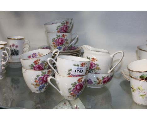 A Czechoslovakian D & H 'Floreate' Teaset comprising six cups, six saucers, six plates, sugar bowl and milk jug (one saucer a