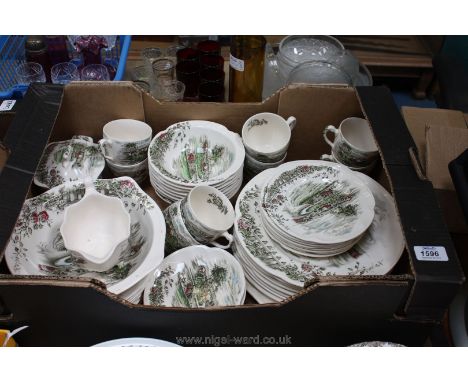 A large quantity of Johnson Bros. 'The Road Home' pattern tableware including dinner plates, cups, saucers, fruit bowls, vege