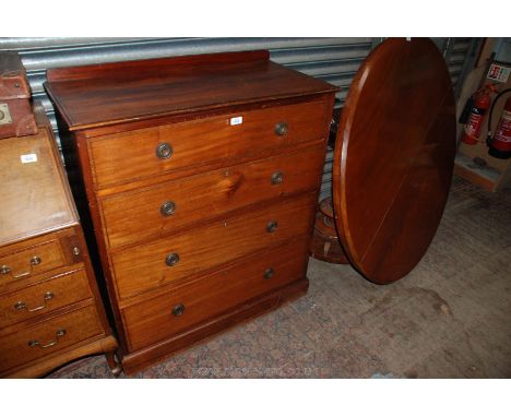 An Edwardian Mahogany Chest of four graduated Drawers with inlaid drawer fronts and ring handles on plinth base. 35 3/4" wide