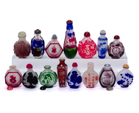 A GROUP OF FIFTEEN OVERLAID GLASS SNUFF BOTTLES
Various decorated with animals, fish or foliage, one example with calligraphy