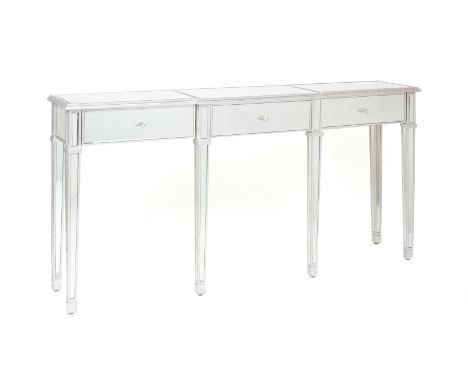 A MIRRORED AND SILVERED CONSOLE TABLE
Breakfront shape, fitted with three drawers, on tapering supports
95 x 176 x 38cm
Condi