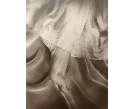 Sally Mann is an American photographer known for her intimate and evocative images, particularly portraits of her children an