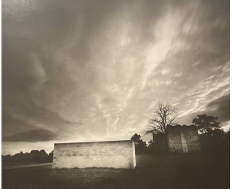 Sally Mann is an American photographer known for her intimate and evocative images, particularly portraits of her children an