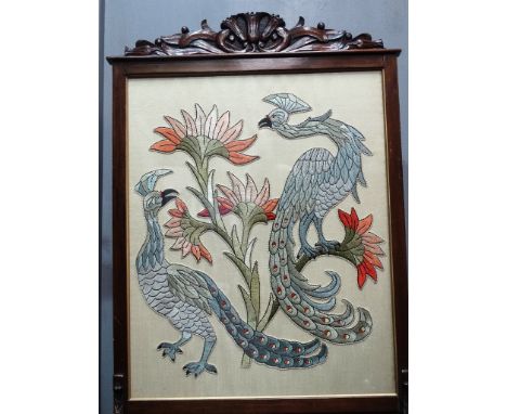 19th century carved fire screen - A carved mahogany surround with convolvulus cresting and silk panel with an embroidery of t