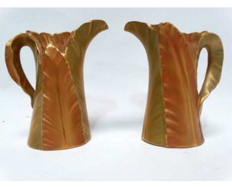 Royal Worcester - A pair of gilt fern small jugs with green mark to base, height 8.5cm. 