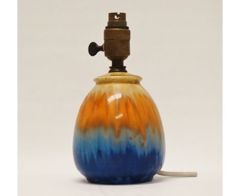 Ruskin Pottery - A high fired, drip glazed ceramic lamp base, various marks including 1931 to base, overall height 22.5cm. 