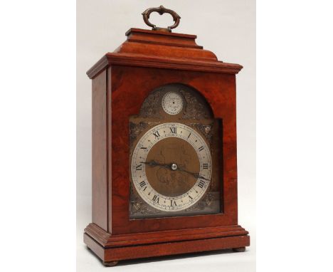 Elliott bracket clock - A burr walnut cased break arch dial bracket clock with Tempus Fugit boss to top and applied silvered 