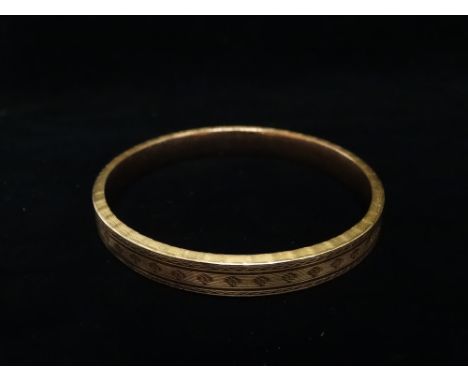 9ct gold bangle - An HG &amp; S 9ct gold bangle with hollow centre, diameter 7.9cm, weight 14g.