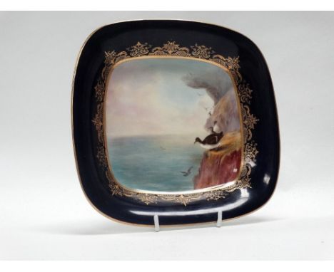 Royal Worcester - A bone china plate with cobalt blue border and gilt decoration, the centre hand painted by George Johnson (