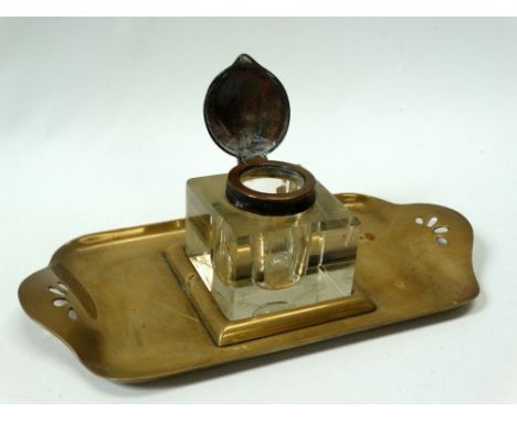 Art Nouveau - A brass and glass standish/desk stand with inkwell and pen rest, length 21.5cm, width 10.5cm.