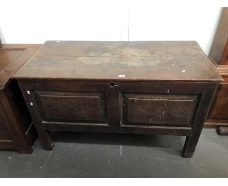 17th century oak coffer - A two panel front with original wire hinge opening, tall styles of dowel construction, height 68cm,