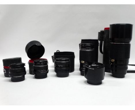 Six Pentax bayonet-fit lenses comprising: SMC Pentax-M Zoom 28-50mm f 3.5 - 4.5 in case; SMC-M 50mm f2 in case; SMC - M 50mm 