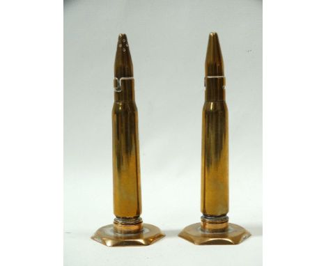 MILITARIA - Trench Art, a pair of cruets formed as empty 42 bullet shells, height 14cm. 