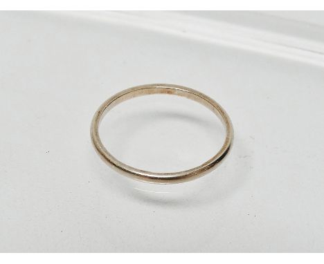 A 14ct white gold ring - A .585 hallmarked ring, size N, weight 1.25g. 