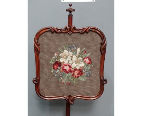 Victorian rosewood polescreen - An adjustable height acanthus carved screen with woolwork floral panel on a column with lotus