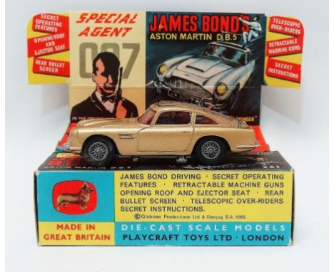 CORGI - Special Agent 007 James Bond's Aston Martin D.B.5, from the James Bond Film 'Goldfinger', No.261, in gold with driver