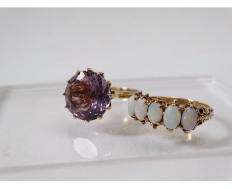 A 9ct gold ring set five opals, size Q and a 9ct gold ring set an amethyst, size N.