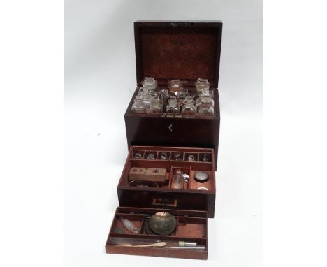 Medicine chest - A Georgian mahogany military medicine chest with brass handle and key lock opening to reveal eleven glass bo
