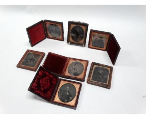 Seven sixth-plate ambrotype portraits, miscellaneous subjects and cases. (7)