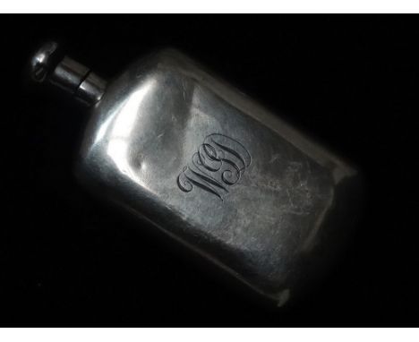 A small silver hip flask with screw cap, engraved monogram, indistinct marks, height 8cm, weight 26.8g.