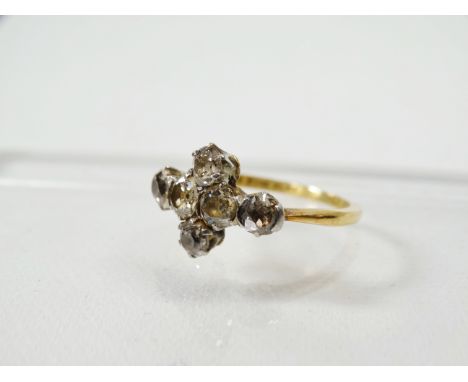 An 18ct gold and platinum set diamond ring set six old cut diamonds, totalling 2.7ct approximately, size N.