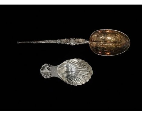 A silver caddy spoon with scallop shell decoration, Birmingham 1963, maker's mark for John Rose, weight 19.6g, together with 