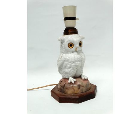 Owl electric table lamp - Formerly an oil lamp stand, a ceramic eared owl on base with octagonal wooden stand, converted to e