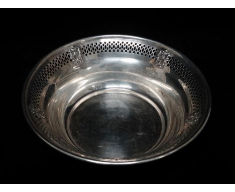 A silver pierced bowl with impressed decoration, marked Sterling 800 to base and Heather Mathews B &amp; M, diameter 12.8cm, 