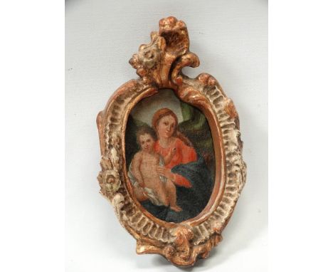 Miniature on panel - An Italian School oil on panel of the Madonna and child in a hand carved gilded Venetian oval frame, pic
